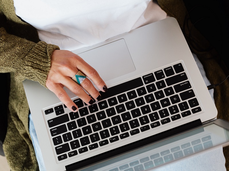 crop-woman-typing-on-laptop-keyboard-4468116